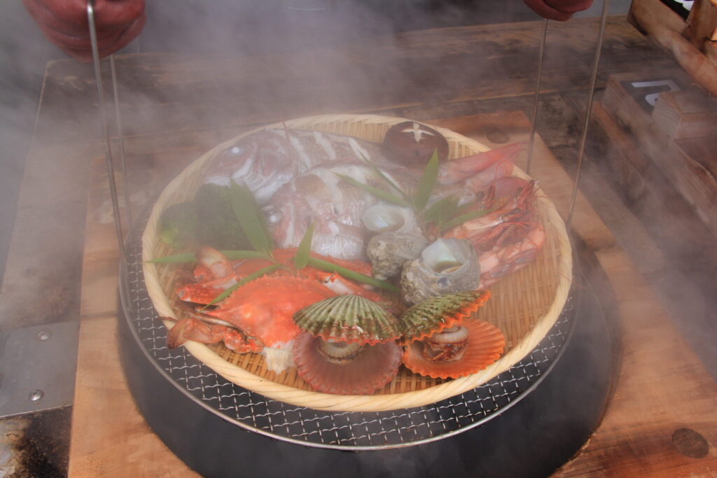 Fresh seafood platter cooked with natural hot spring steam (Jigoku Mushi) in Beppu, Oita - Japan Navi Journey