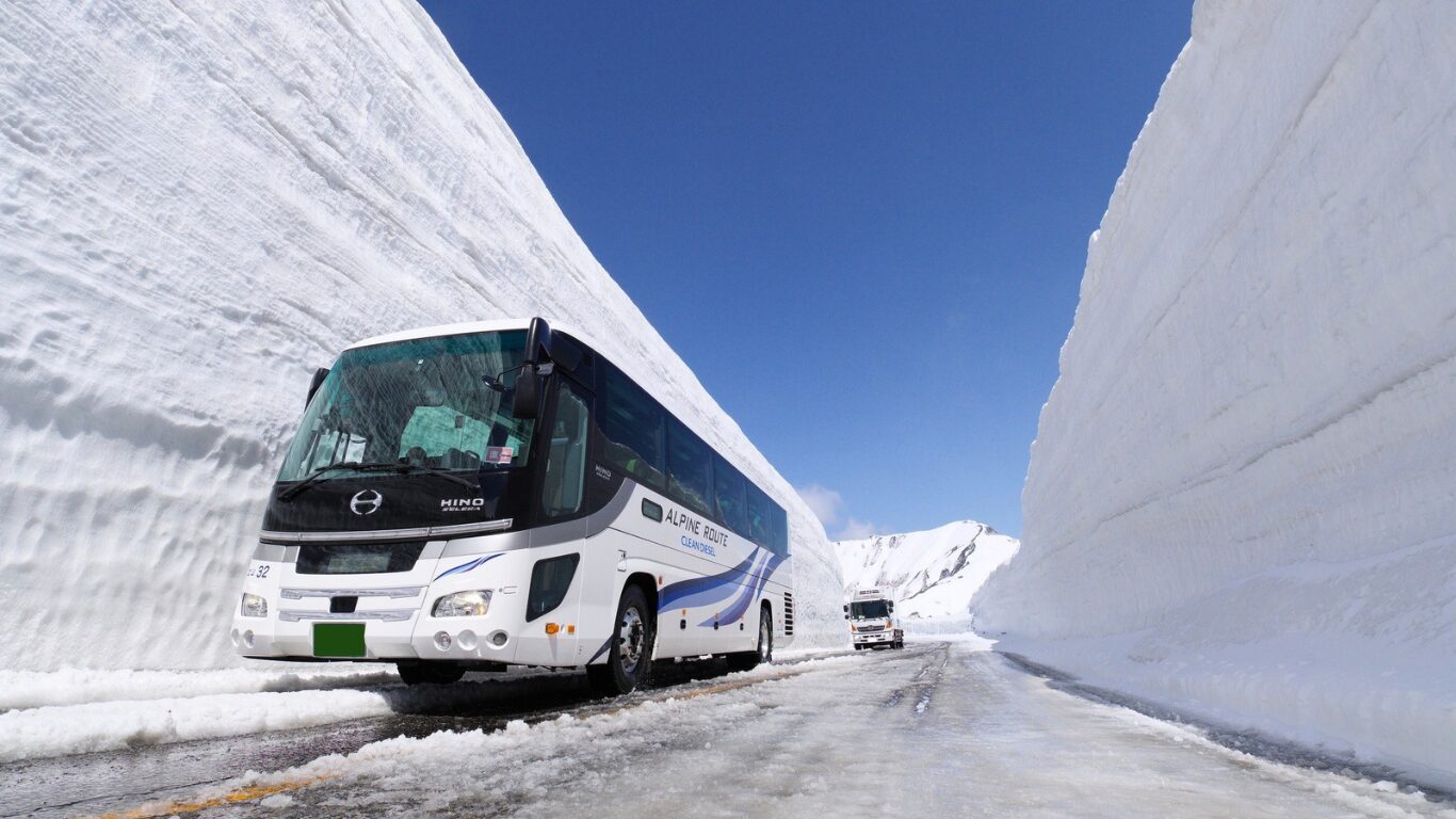 Towering snow walls of Yuki-no-Otani on the Tateyama Kurobe Alpine Route - Exclusive Private Japan Tour by Japan Navi Journey