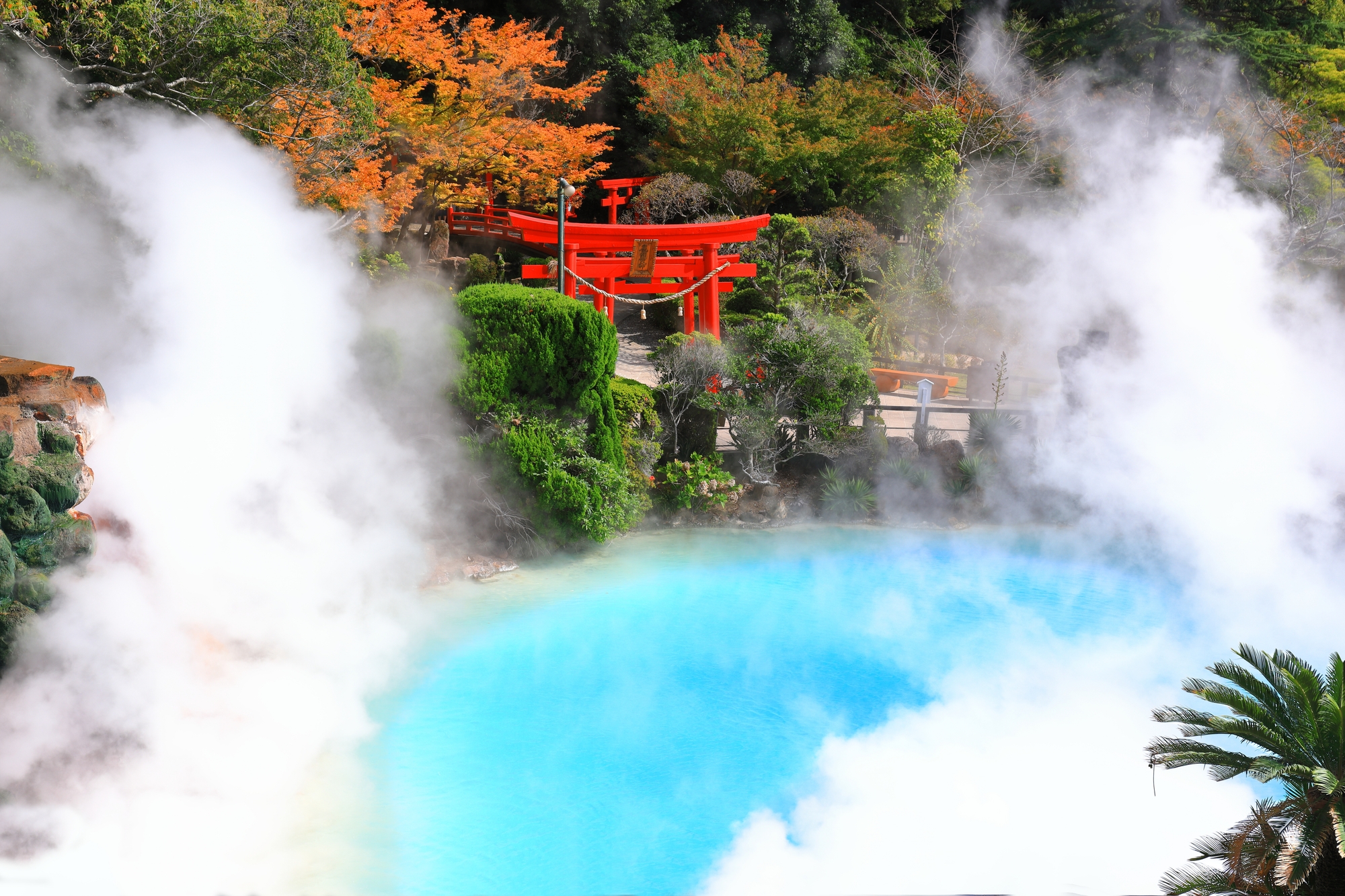 Steaming cobalt-blue thermal pool at Umi Jigoku, one of the Hells of Beppu in Oita - Exclusive Private Japan Tour by Japan Navi Journey